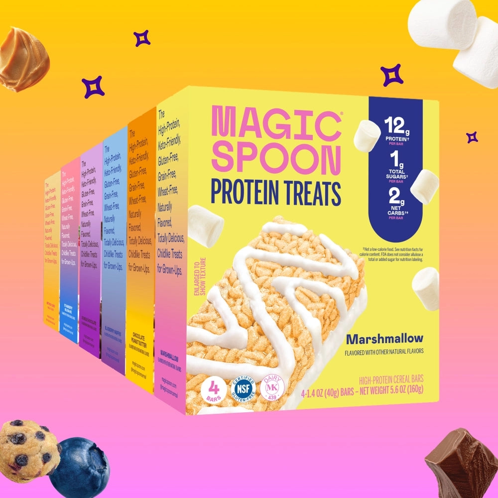 Magic Spoon protein treats boxes surrounded by chocolate and berries